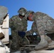 Soldiers of 2nd Battalion, 7th Infantry Regiment conduct vehicle maintenance at Camp Konotop, Poland.