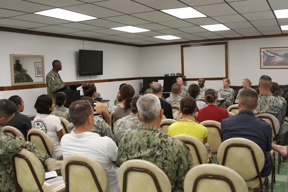 Service members arm-in-arm