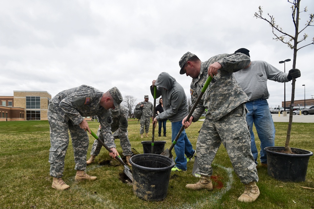 Local service members plant trees for Earth Day