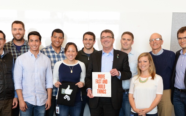 Secretary of Defense Ash Carter takes a photograph with veterans at Facebook