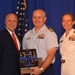 Cmdr. Christopher Strong receives gift from New Orleans Mayor Mitch Landrieu