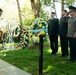 Representatives from the Embassy of Kazakhstan lay a wreath at the Spirit of the Elbe marker in Arlington National Cemetery