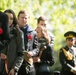 Attendees wait to lay flowers on The Spirit of the Elbe marker in Arlington National Cemetery