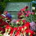 Flowers lay on the Spirit of the Elbe marker in Arlington National Cemetery