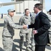Secretary of Defense Ash Carter presents Airmen with SECDEF coin