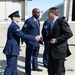 Secretary of Defense Ash Carter presents Airmen with the SECDEF coin
