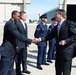 Secretary of Defense Ash Carter presents Airmen with the SECDEF coin