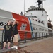 NOLA Navy Week - Couple poses for selfie in front of CGC Dauntless