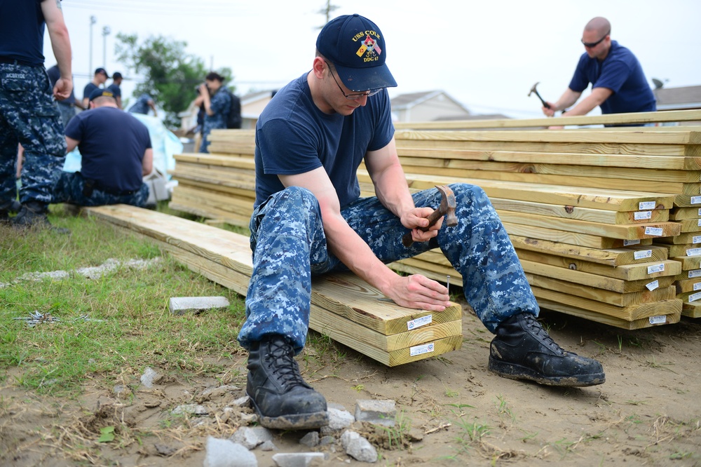 Sailors help build homes for New Orleans Area Habitat for Humanity