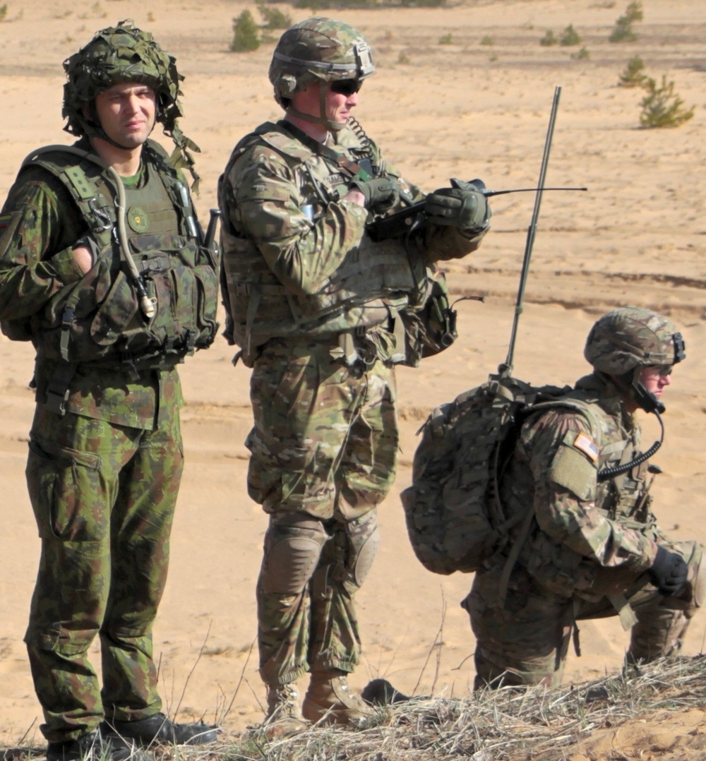 Team Eagle and Iron Wolf conduct live-fire exercise