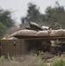 Iraqi soldier assaults bunker in exercise