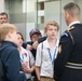 Members of The Old Guard talk to visitors in the Welcome Center of Arlington National Cemetery