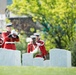 Bugler from Marine Barracks Washington (8th and I) plays Taps during the graveside service for US Marine Corps Maj. Elizabeth Kealey in Arlington National Cemetery