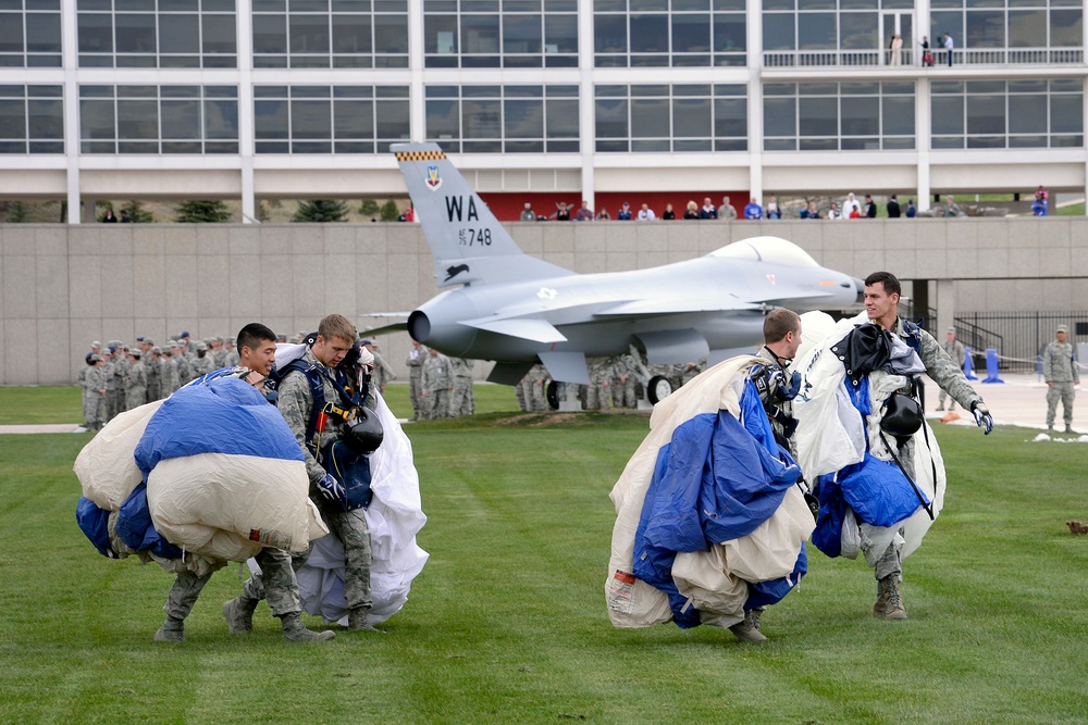 US Air Force Academy Wings of Blue parachute team jump onto the terrazzo before an AFSOC CV-22 Demonstration supporting the yearly cadet exercise Polaris Warrior
