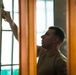 A Caring Community: U.S. Marines volunteer at historic Spanish convent