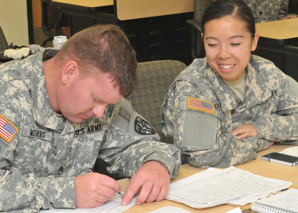 Nguyen helps review APFT cards