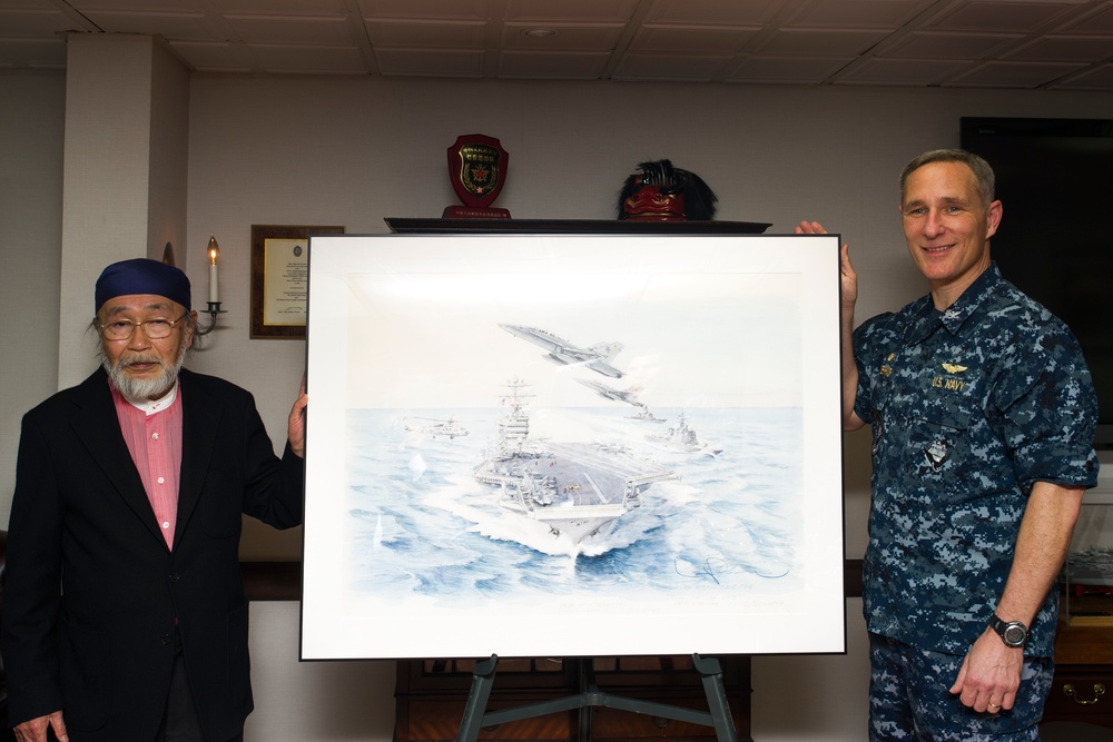 Japanese artist tours USS George Washington
