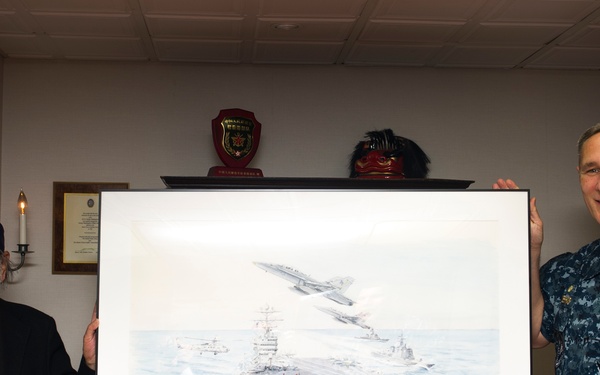 Japanese artist tours USS George Washington