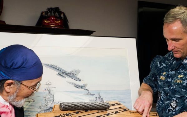 Japanese artist tours USS George Washington