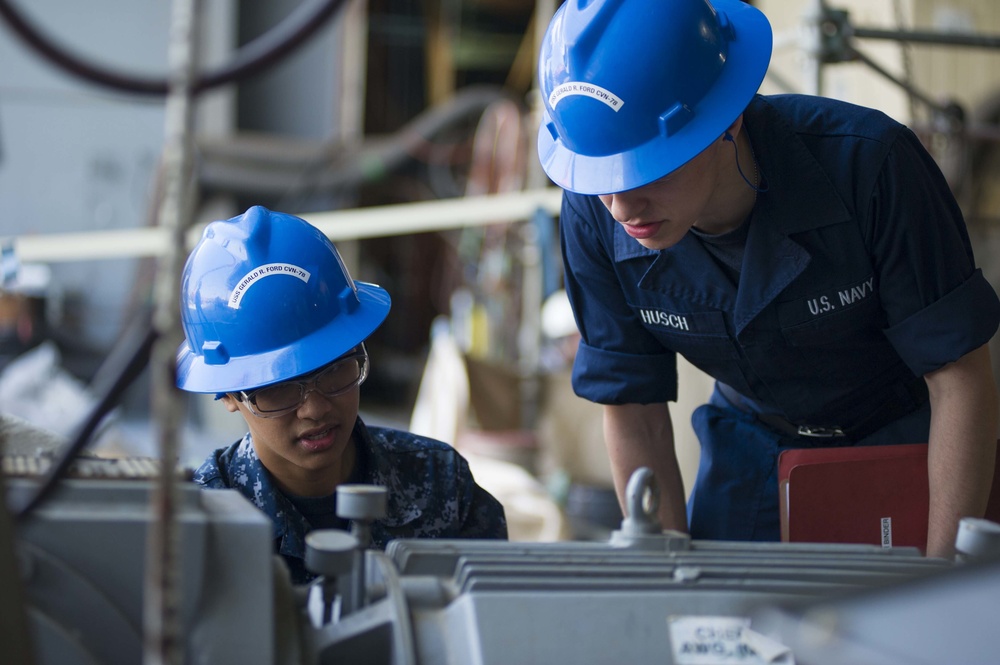 Pre-commissioning Unit Gerald R. Ford (CVN 78) Sailors train on gypsy winch