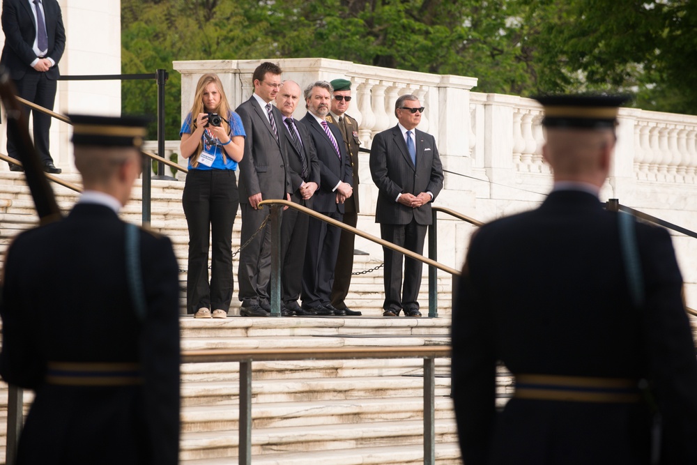 Croatia minister of veterans affairs watches a changing of the guard ritual at Tomb of the Unknown Soldier, Arlington National Cemetery