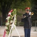 A bugler from The US Army Band 'Pershing’s Own' plays Taps during a wreath-laying ceremony at the Tomb of the Unknown Soldier, Arlington National Cemetery