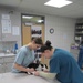 Performing canine phlebotomy