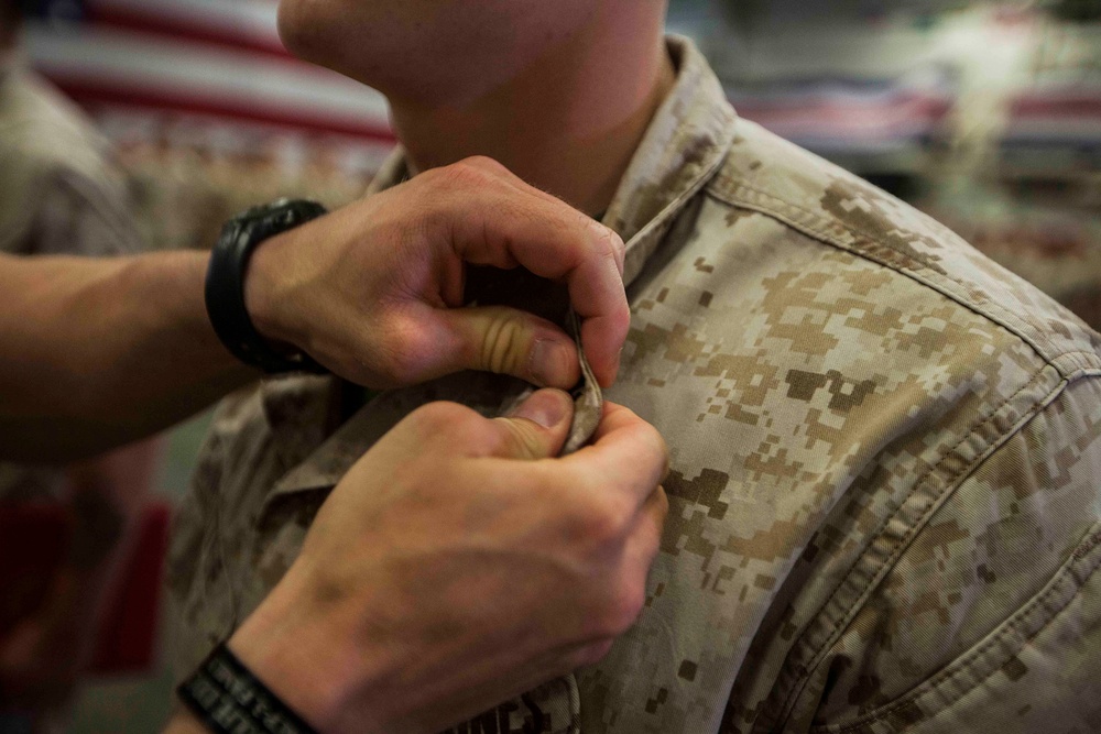 22nd MEU promotes, re-enlists Marines aboard the USS Wasp