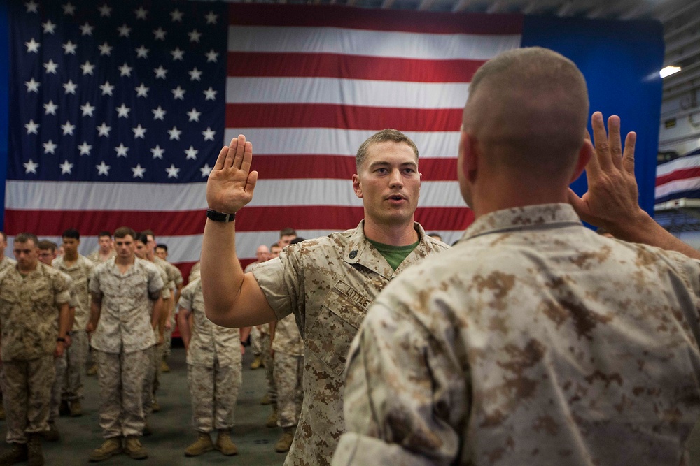 22nd MEU promotes, re-enlists Marines aboard the USS Wasp