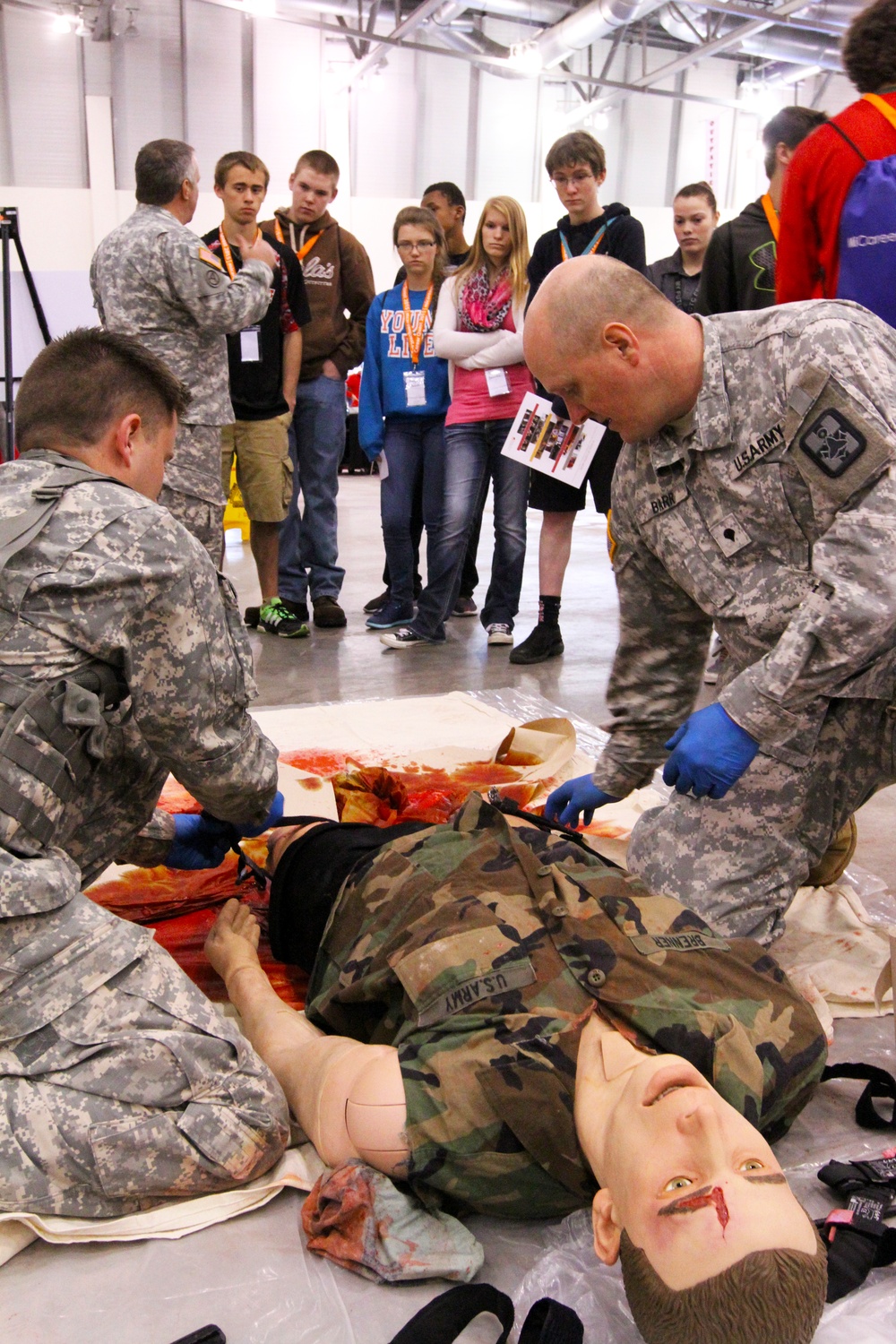 Army Reserve soldiers demonstrate traumatic care to 6th-12th graders