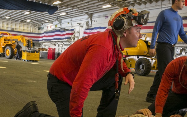 Sailors practice mass casualty evacuation aboard USS Wasp
