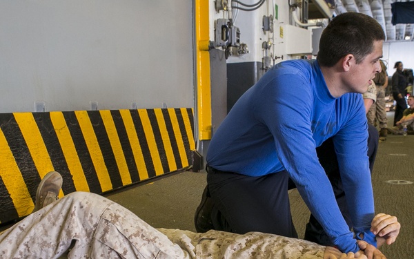 Sailors practice mass casualty evacuation aboard USS Wasp