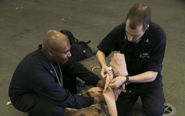 Sailors practice mass casualty evacuation aboard USS Wasp
