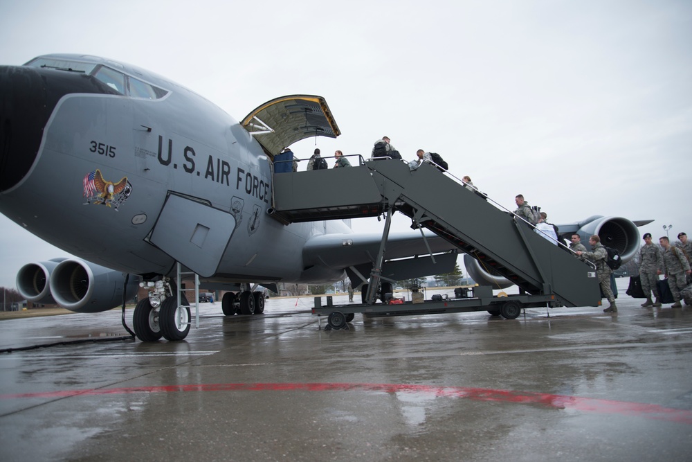 Airmen board a KC-135 refueling tanker