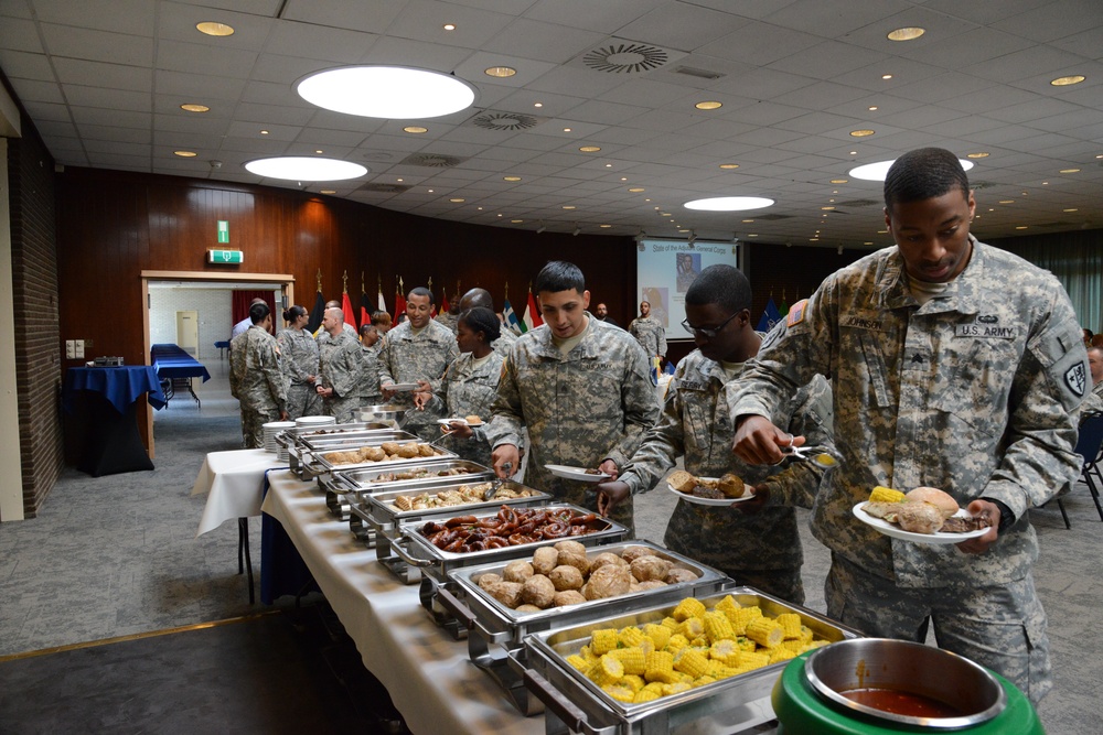 AG corps Chief Warrant Officer 5 Jones and Command Sgt. Maj. Shirley briefing in SHAPE