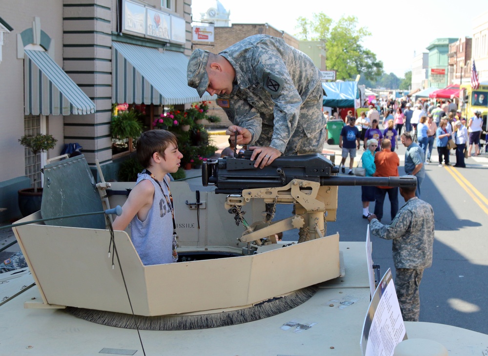 2nd Battalion, 4th Infantry Soldiers setup MayFest display