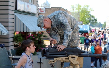 2nd Battalion, 4th Infantry Soldiers setup MayFest display