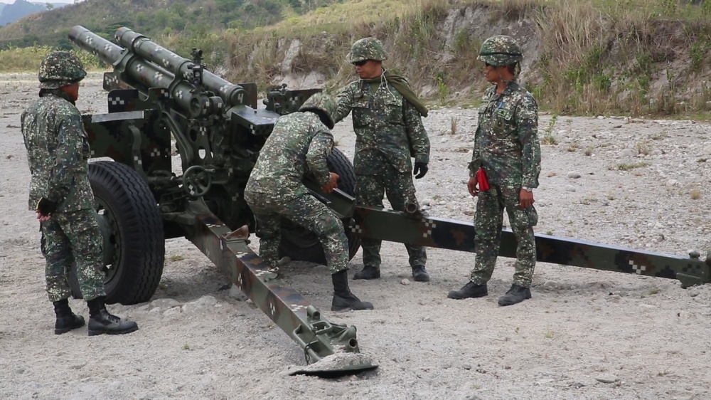 Philippine, 12th Marine Regiment artillery Marines providing long range fire support