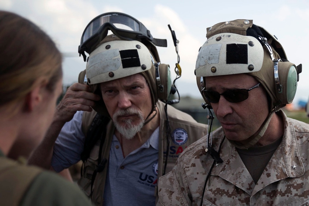 U.S. Marine aircraft survey Nepal earthquake damage, support USAID efforts