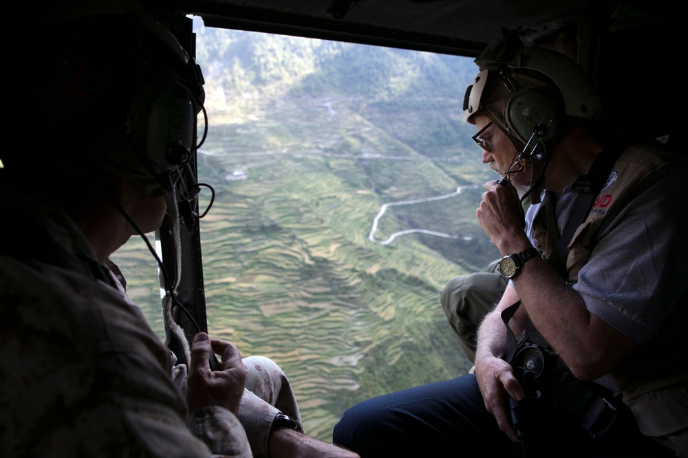 U.S. Marine aircraft survey Nepal earthquake damage, support USAID efforts