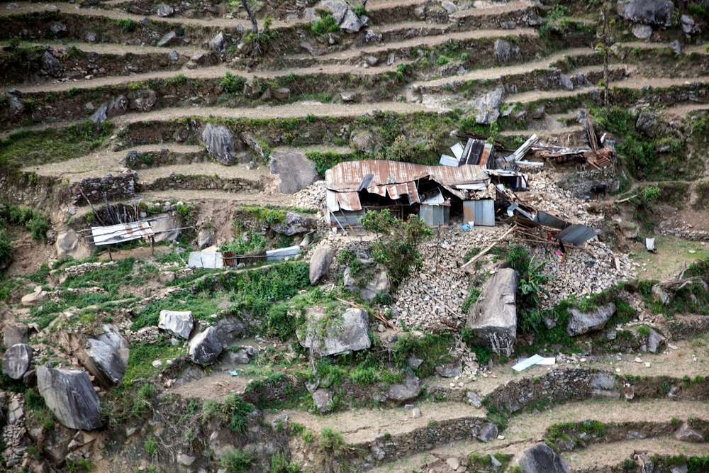 U.S. Marine aircraft survey Nepal earthquake damage, support USAID efforts