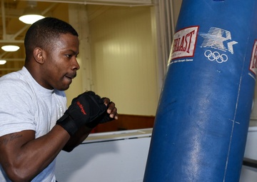 Airman finds opportunity, shares fighter’s spirit with teens