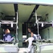 Kids exploring the field litter ambulance