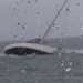 Coast Guard rescues 2 from storm-tossed sailboat
