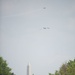 World War II era planes fly over Washington seen from Arlington National Cemetery