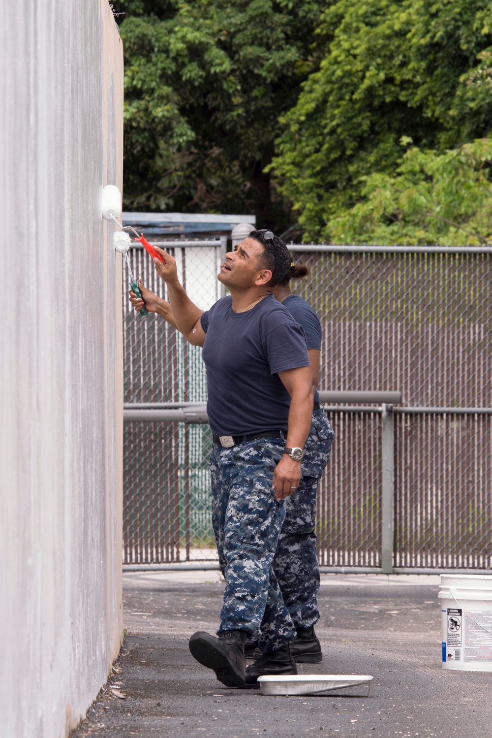 Sailors paint crisis center during Fleet Week Port Everglades