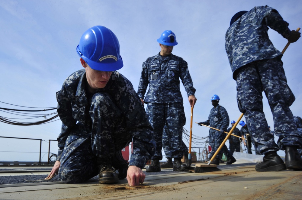 PCU Gerald R. Ford Sailors participate in FOD walkdown