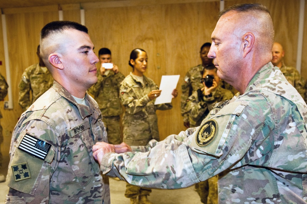 Full Circle – Army Officers, Father and Son Promote Each Other