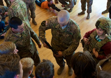 US Soldiers give Latvian students a crash course in Army, American culture