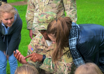 US Soldiers give Latvian students a crash course in Army, American culture